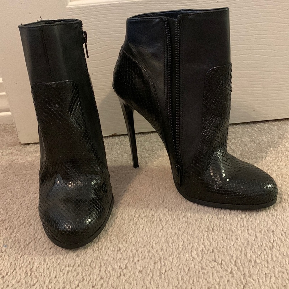 Black snack skin bootie heels